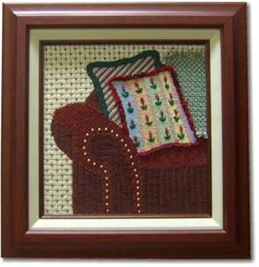 This is a wonderful piece, and it was a real joy to make. Here is a picture of it hanging on the wall of my framer's shop.