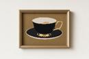 Gold And Black Cup And Saucer