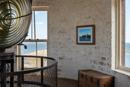 Lighthouse On The Sea